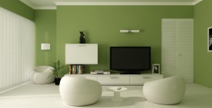 Интерьер зеленой комнаты с мебелью из ротанга